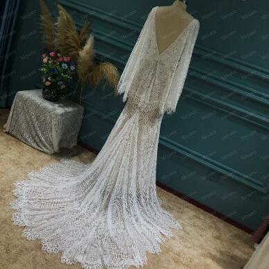 W1579 Plunging V Neck Boho Chic Lace Wedding Dress..